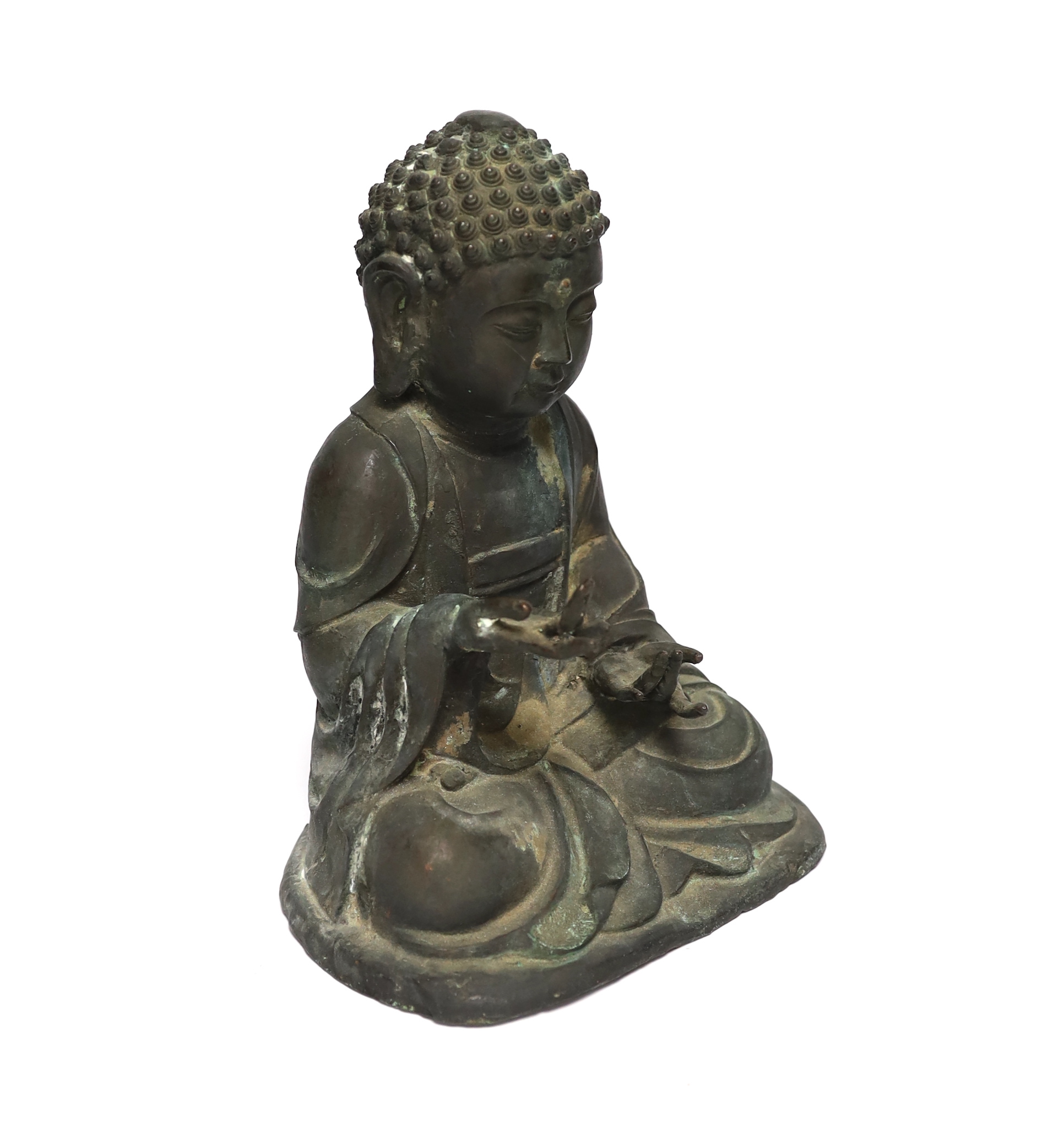 A Chinese bronze figure of Buddha Shakyamuni, Ming style, 25cm high